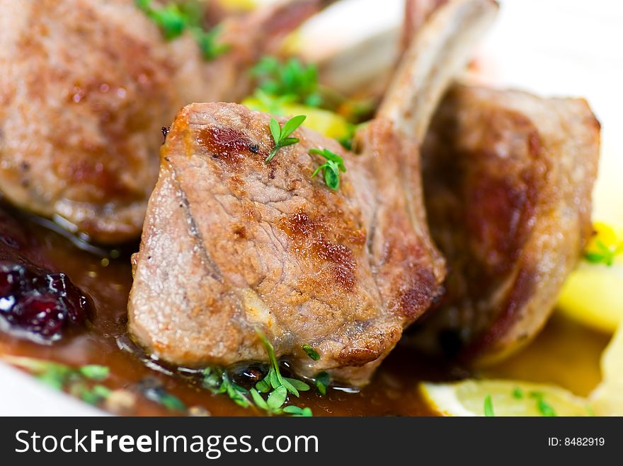 Close up picture of a roasted lamb chop-fillet- and vegetables