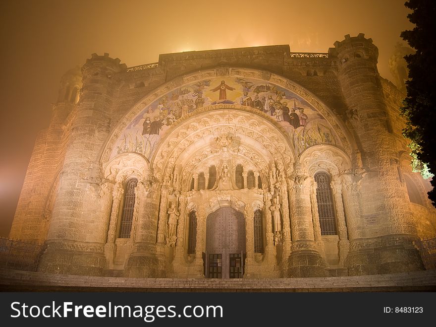 Tibidabo church in Barcelona, Spain. Foggy night.