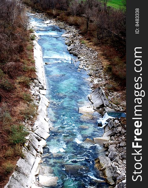 Torrent and blue water in the winter season