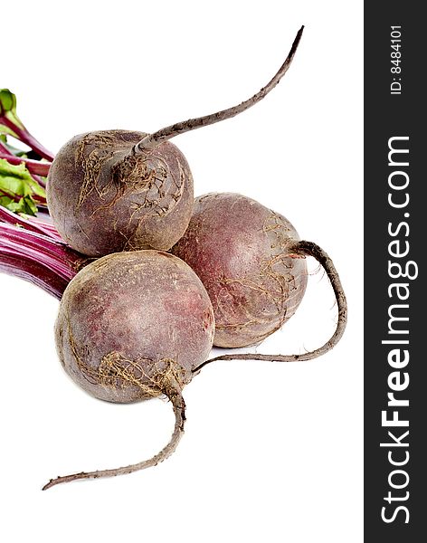 Three beet roots isolated on white.