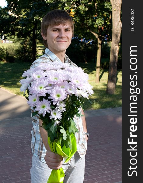 Boy Presenting Flowers