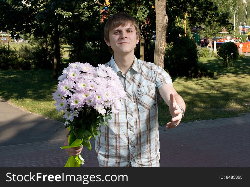 Boy presenting flowers