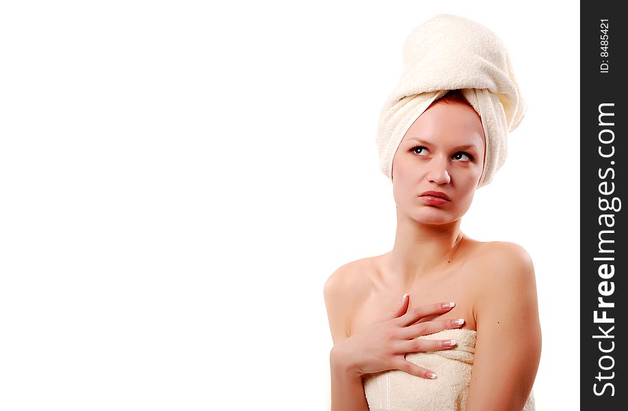 Portrait of beautiful woman in white towels