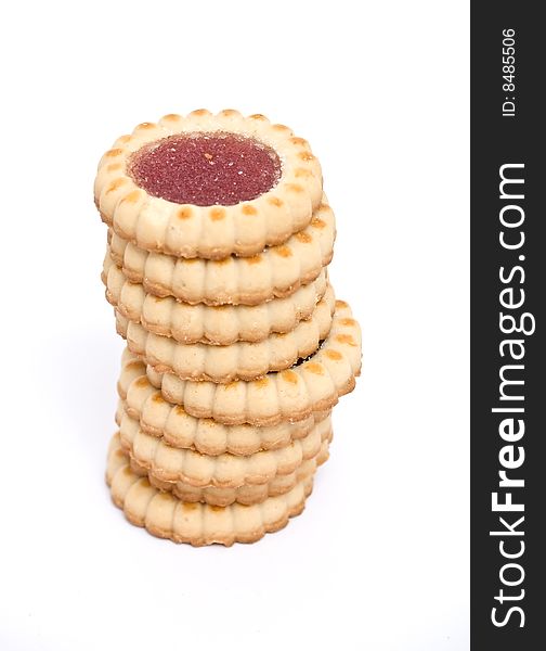 sweet biscuits filled with raspberrs 	
isolated on a white background