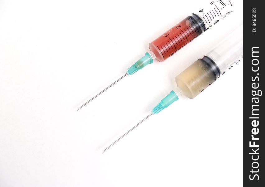 Syringes 	
isolated on a white background