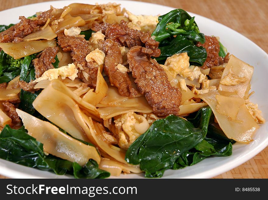 Beef and spinach with egg noodles