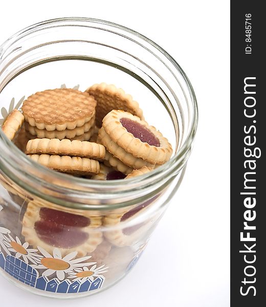 Jar with biscuits photograph in the foreground