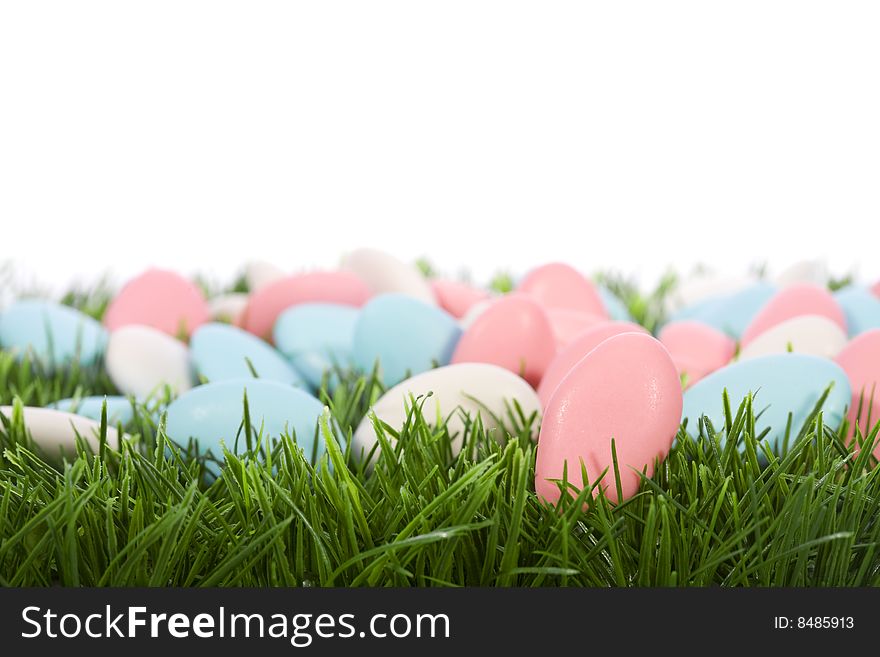 Easter almonds candy on green grass