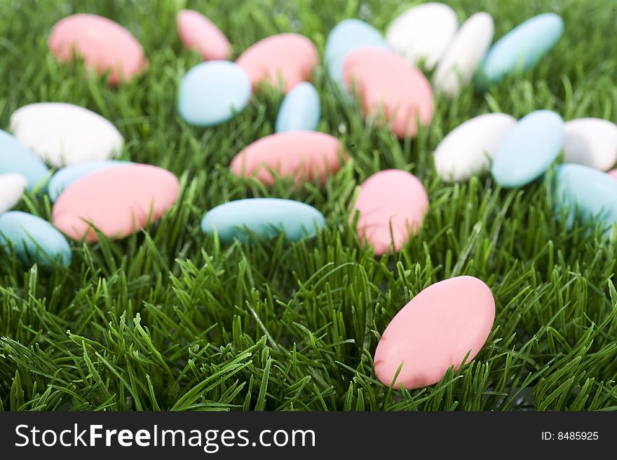 Easter almonds candy on green grass