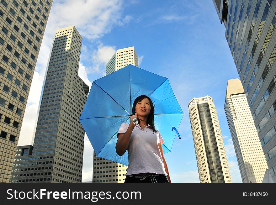 Female Asian Chinese Girl With Umbrella In City