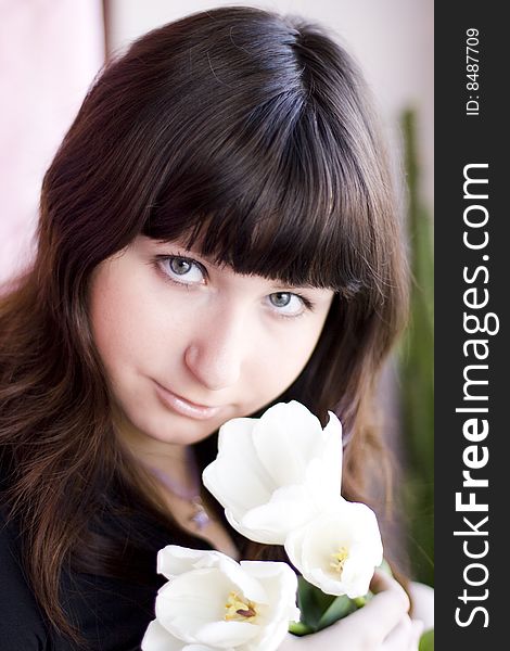 Girl with three white tulips. Girl with three white tulips