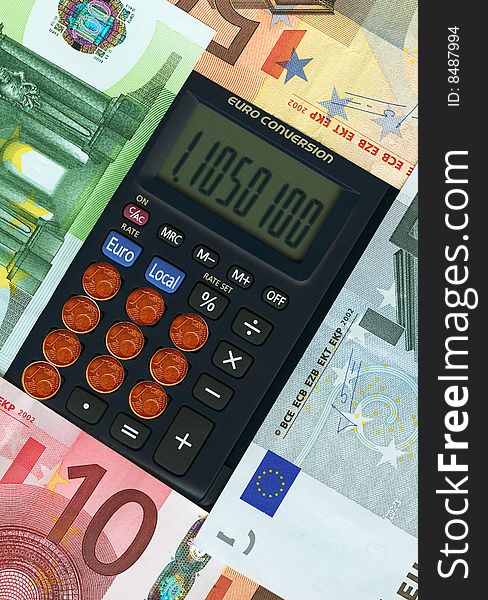 Euro union paper banknotes with calculator and coins. Euro union paper banknotes with calculator and coins.