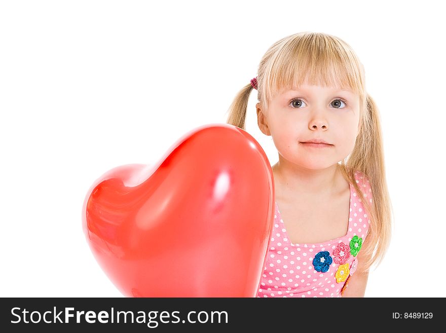 Girl in pink dress and with red heart-shaped balloon. Girl in pink dress and with red heart-shaped balloon