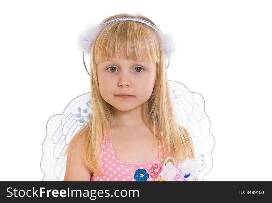 Girl in pink dress and with angel wings