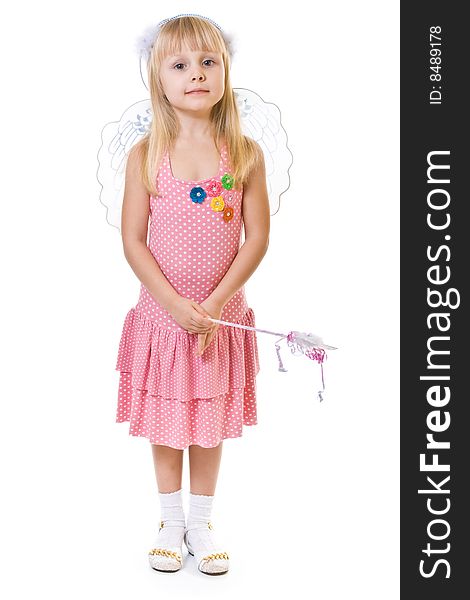 Girl in pink dress holds the magic wand on white background
