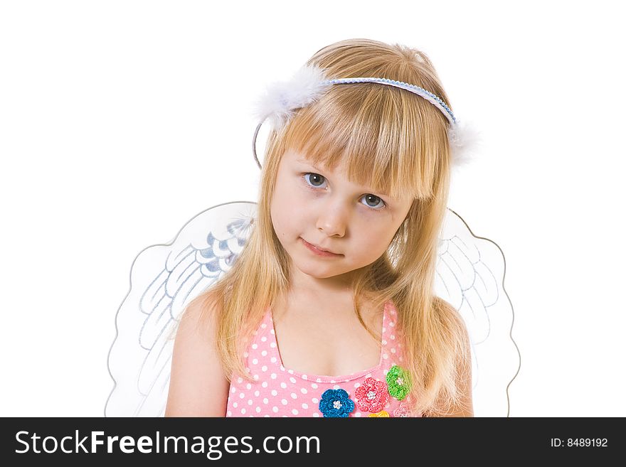 Girl in pink dress and with angel wings