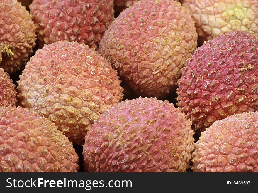 Closeup of fresh litchis as background. Closeup of fresh litchis as background