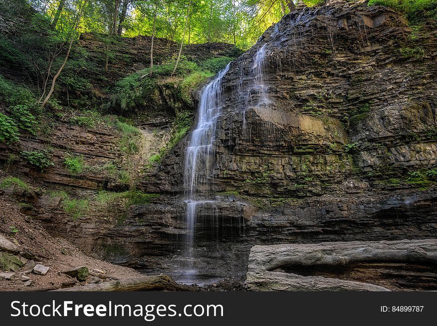 Tiffany Falls is a 21 metre high ribbon waterfall located in the Tiffany Falls Conservation Area, just off of Wilson Street East, Ancaster, in Hamilton, Ontario, Canada. Tiffany Falls was named after Dr. Oliver Tiffany, the district&#x27;s first doctor. Born in Massachusetts, he studied medicine at the Philadelphia Medical College, and came to Ancaster Township in 1796. There hasn&#x27;t been a lot of rain lately so the falls weren&#x27;t very impressive. I may go back in the fall. Tiffany Falls is a 21 metre high ribbon waterfall located in the Tiffany Falls Conservation Area, just off of Wilson Street East, Ancaster, in Hamilton, Ontario, Canada. Tiffany Falls was named after Dr. Oliver Tiffany, the district&#x27;s first doctor. Born in Massachusetts, he studied medicine at the Philadelphia Medical College, and came to Ancaster Township in 1796. There hasn&#x27;t been a lot of rain lately so the falls weren&#x27;t very impressive. I may go back in the fall.