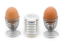 Two Eggcups With A Salt Can Stock Photography Two Eggcups With A Salt Can Stock Photography