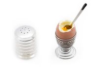 An Egg On An Eggcup Next To A Salt Can Stock Images An Egg On An Eggcup Next To A Salt Can Stock Images