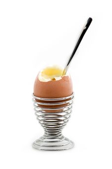 An Eggcup With An Pealed Egg Royalty Free Stock Photography An Eggcup With An Pealed Egg Royalty Free Stock Photography