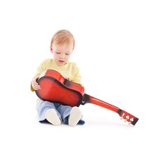 Portrait Of The Little Boy With Acoustic Guitar Royalty Free Stock Image