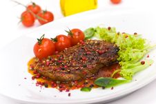 A Grilled Peppercorn - Steak With Tomato Lettuce Stock Photos A Grilled Peppercorn - Steak With Tomato Lettuce Stock Photos