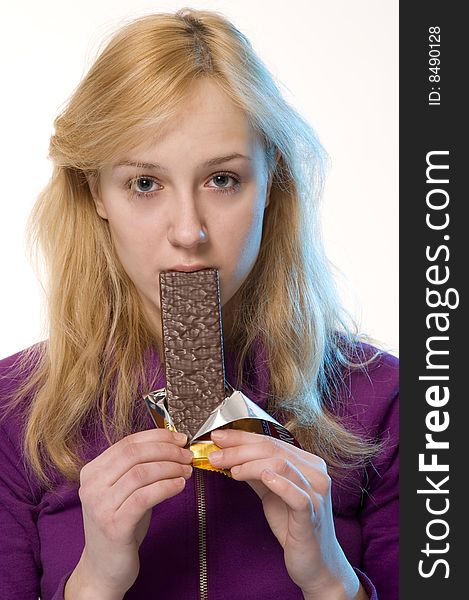Girl with the chocolate wafer. Girl with the chocolate wafer