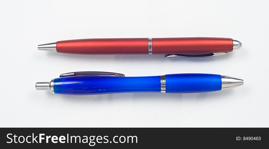 Closeup of two retractable ballpoint pens