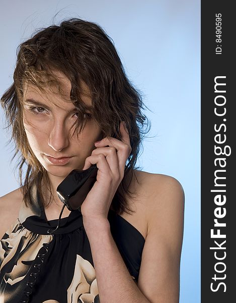 Young woman's portrait from telephone. Young woman's portrait from telephone