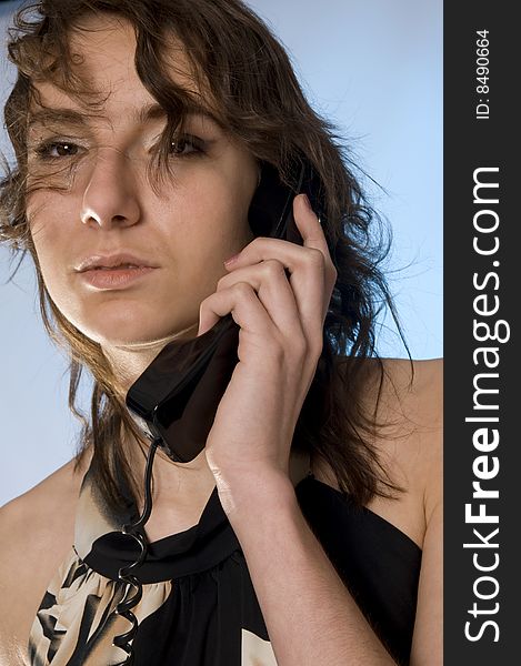 Young woman's portrait from telephone. Young woman's portrait from telephone
