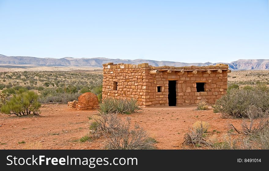 A primitive, traditional native american dwelling in the desert. A primitive, traditional native american dwelling in the desert