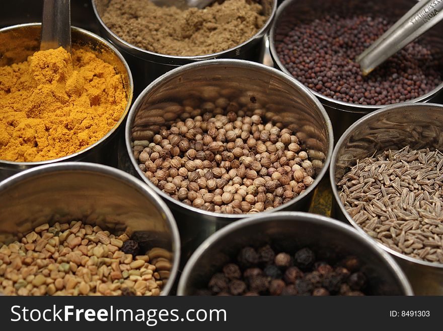 Spices commonly used in Indian cooking: Cumin, Turmeric, Mustard Seeds, Garam Masala, Fenugreek and Pepper. Spices commonly used in Indian cooking: Cumin, Turmeric, Mustard Seeds, Garam Masala, Fenugreek and Pepper.