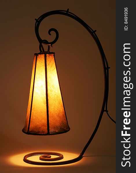 Hand-made table lamp with leather shade. Hand-made table lamp with leather shade