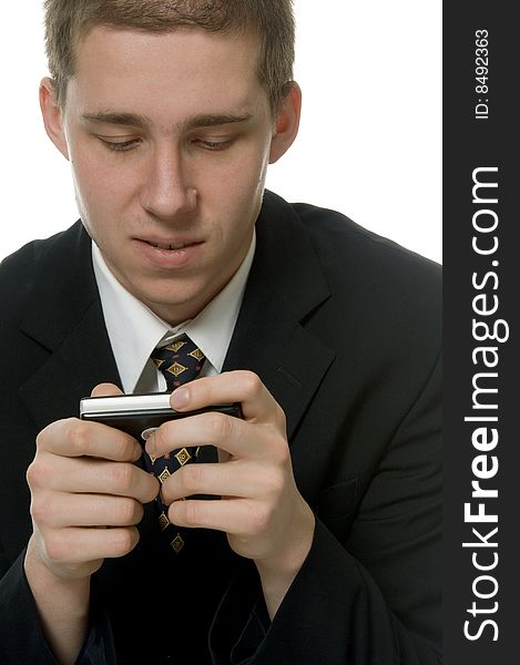 Elegant young man plays on mobile device. Elegant young man plays on mobile device