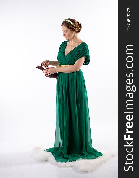 Lady in green antique dress handing jug on white background. Lady in green antique dress handing jug on white background