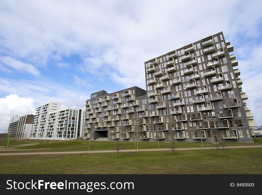 Photo of new apartment buildings in Ørestaden, Denmark. Wide perspective.