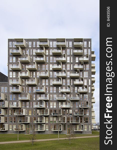 Apartment building in Ørestaden, Denmark. Facade woth lots of balconies. Apartment building in Ørestaden, Denmark. Facade woth lots of balconies.