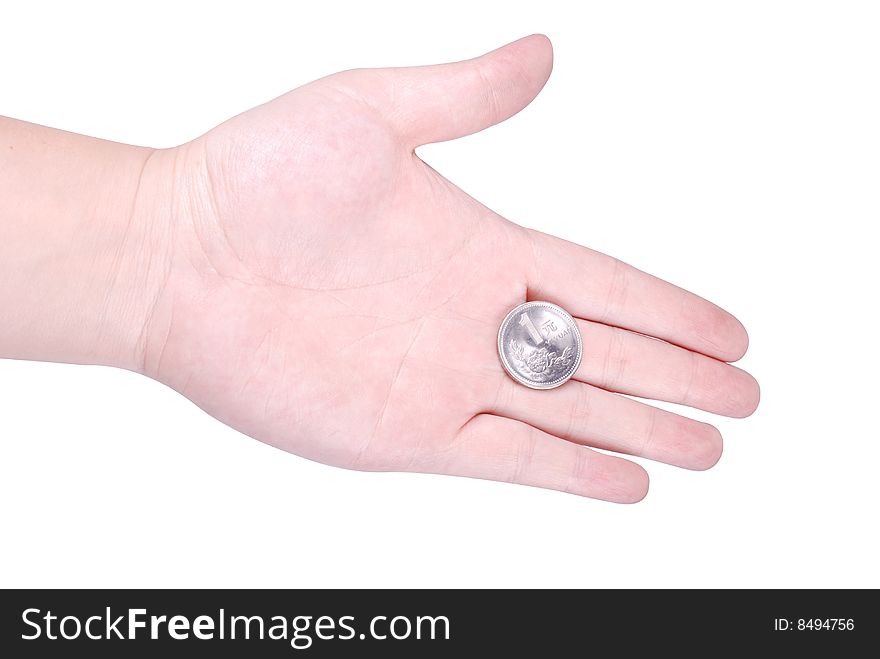 A coin in hand isolated on white background