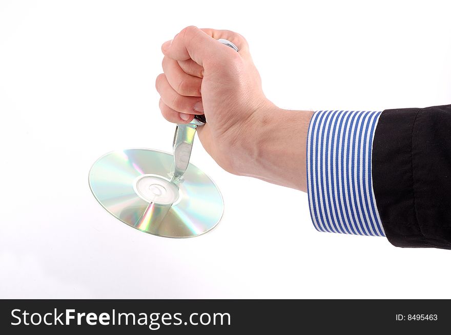 A sharp knife is cutting a disk. A sharp knife is cutting a disk