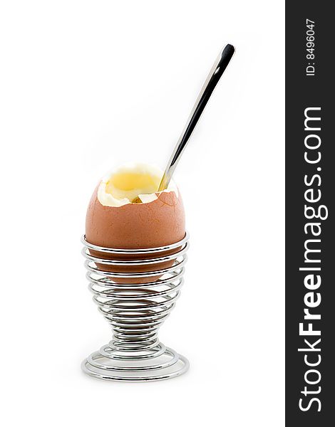 An Eggcup With An Pealed Egg