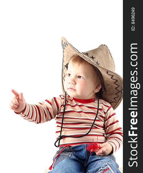 Little boy in cowboy hat isolated on white background