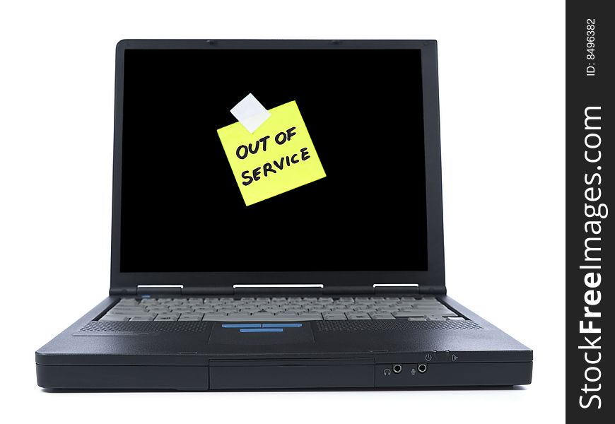 Black laptop with a Out of Service sticky note. Isolated on white. Black laptop with a Out of Service sticky note. Isolated on white.