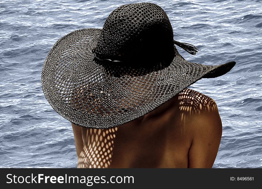 Topless young girl wearing hat. Topless young girl wearing hat.