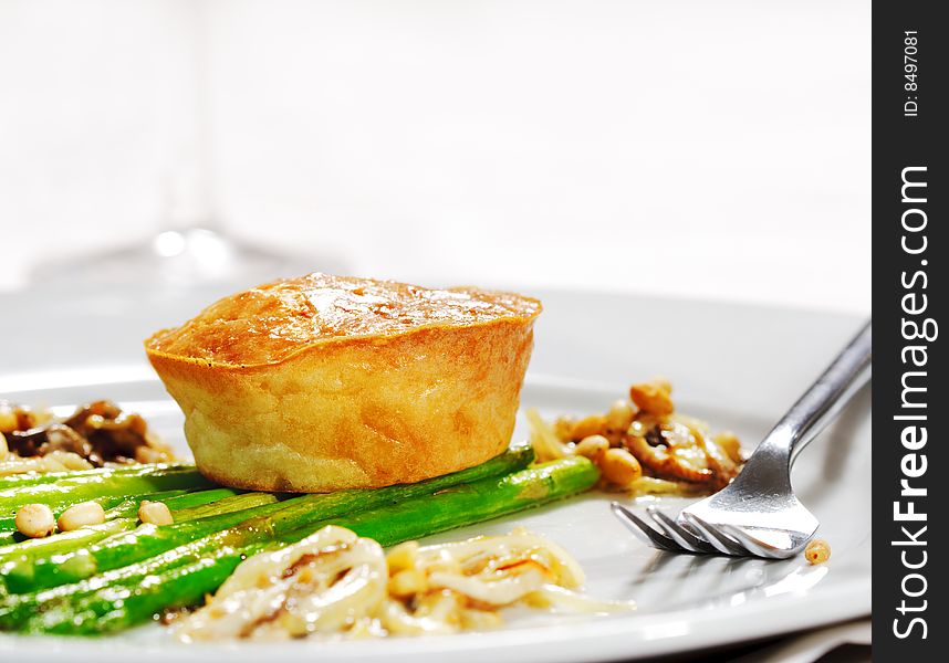 Fork and Fresh Asparagus with Cake. Selective Focus