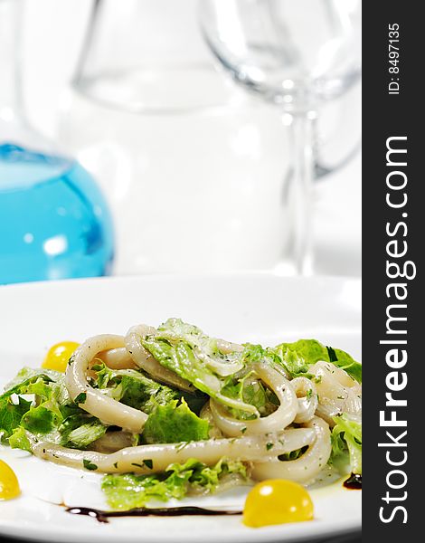Seafood Salad with a Jug on a Background