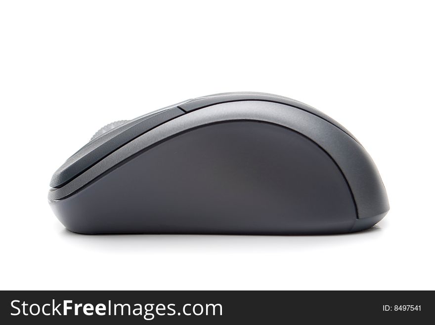 Ergonomic wireless computer mouse from side. 
focus on button.