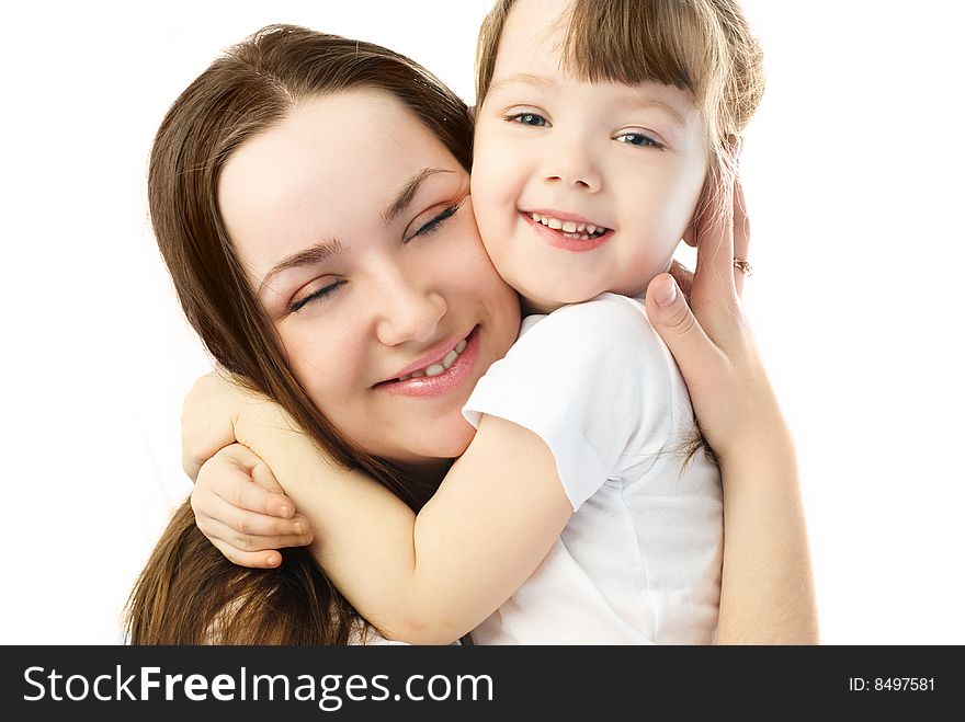 Happy family, young mother and her little daughter embracing and laughing. Happy family, young mother and her little daughter embracing and laughing