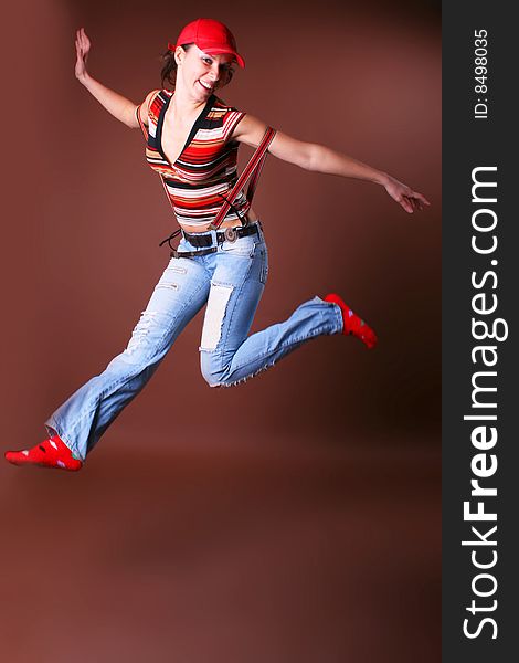 The young beautiful girl during active leisure on a white background