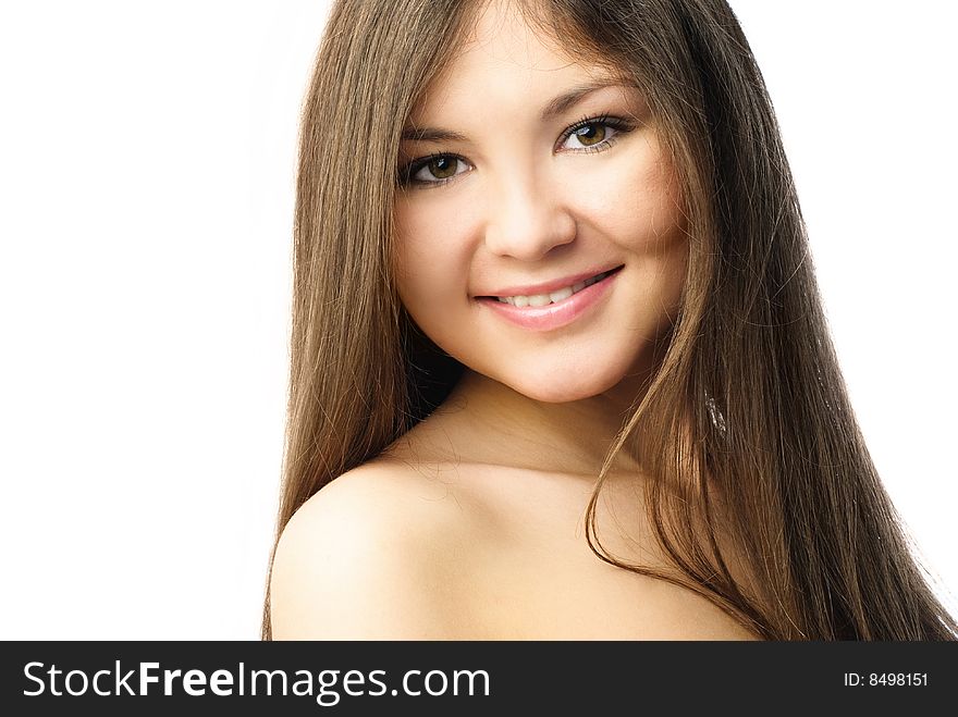 Portrait of a beautiful young woman with long hair against white background